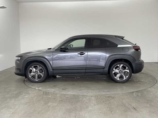 マツダ ＭＸ－３０ インダストリアルクラシック 兵庫県 2021(令3)年 2.7万km マシーングレープレミアムM ・純正ナビ/Bluetooth/AM/FM/TV/HDMI/・バックカメラ/・スマートブレーキサポート/・スマートブレーキサポート（後退時）/・緊急時車線維持支援/・ディスタンス＆スピードアラート/・レーンキープアシスト/・後側方接近車両検知/・ブラインドスポットモニター/・レーダクルーズコントロール/・オートハイビーム/・ステアリングスイッチ/・ステアリングヒーター/・ハーフレザーシート/・前席シートヒーター/・運転席パワーシート（メモリー付き）/・純正フロアマット/・純正アルミホイールタイヤ/・LEDヘッドライト/・前後ドライブレコーダー/・ETC/・取扱説明書/・保証書/・スペアキー/・ベーシックパッケージ/・エクステリアパッケージ/・インテリアパッケージ/・ユーティリティーパッケージ