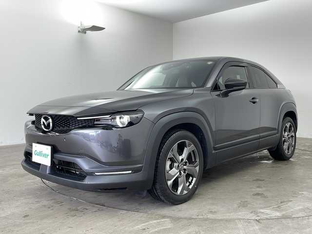 マツダ ＭＸ－３０ インダストリアルクラシック 兵庫県 2021(令3)年 2.7万km マシーングレープレミアムM ・純正ナビ/Bluetooth/AM/FM/TV/HDMI/・バックカメラ/・スマートブレーキサポート/・スマートブレーキサポート（後退時）/・緊急時車線維持支援/・ディスタンス＆スピードアラート/・レーンキープアシスト/・後側方接近車両検知/・ブラインドスポットモニター/・レーダクルーズコントロール/・オートハイビーム/・ステアリングスイッチ/・ステアリングヒーター/・ハーフレザーシート/・前席シートヒーター/・運転席パワーシート（メモリー付き）/・純正フロアマット/・純正アルミホイールタイヤ/・LEDヘッドライト/・前後ドライブレコーダー/・ETC/・取扱説明書/・保証書/・スペアキー/・ベーシックパッケージ/・エクステリアパッケージ/・インテリアパッケージ/・ユーティリティーパッケージ