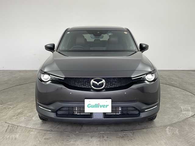 マツダ ＭＸ－３０ インダストリアルクラシック 兵庫県 2021(令3)年 2.7万km マシーングレープレミアムM ・純正ナビ/Bluetooth/AM/FM/TV/HDMI/・バックカメラ/・スマートブレーキサポート/・スマートブレーキサポート（後退時）/・緊急時車線維持支援/・ディスタンス＆スピードアラート/・レーンキープアシスト/・後側方接近車両検知/・ブラインドスポットモニター/・レーダクルーズコントロール/・オートハイビーム/・ステアリングスイッチ/・ステアリングヒーター/・ハーフレザーシート/・前席シートヒーター/・運転席パワーシート（メモリー付き）/・純正フロアマット/・純正アルミホイールタイヤ/・LEDヘッドライト/・前後ドライブレコーダー/・ETC/・取扱説明書/・保証書/・スペアキー/・ベーシックパッケージ/・エクステリアパッケージ/・インテリアパッケージ/・ユーティリティーパッケージ