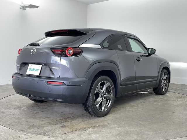 マツダ ＭＸ－３０ インダストリアルクラシック 兵庫県 2021(令3)年 2.7万km マシーングレープレミアムM ・純正ナビ/Bluetooth/AM/FM/TV/HDMI/・バックカメラ/・スマートブレーキサポート/・スマートブレーキサポート（後退時）/・緊急時車線維持支援/・ディスタンス＆スピードアラート/・レーンキープアシスト/・後側方接近車両検知/・ブラインドスポットモニター/・レーダクルーズコントロール/・オートハイビーム/・ステアリングスイッチ/・ステアリングヒーター/・ハーフレザーシート/・前席シートヒーター/・運転席パワーシート（メモリー付き）/・純正フロアマット/・純正アルミホイールタイヤ/・LEDヘッドライト/・前後ドライブレコーダー/・ETC/・取扱説明書/・保証書/・スペアキー/・ベーシックパッケージ/・エクステリアパッケージ/・インテリアパッケージ/・ユーティリティーパッケージ