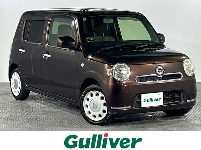 ダイハツ ミラ ココア X スペシャルコーデ 沖縄県 2014(平26)年 9.5万km プラムブラウンクリスタルマイカ 禁煙車　/純正７インチナビ（ＢＴ，フルセグ，ラジオ，ＣＤ／ＤＶＤ）　/ＥＴＣ　/フロアマット　/純正ドアバイザー　/エコアイドル　/電動格納ミラー　/ＵＳＢポート　/ベンチシート　/スマートキー