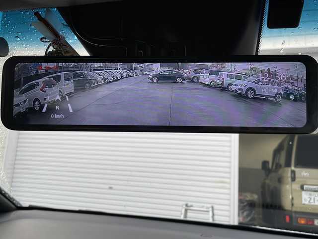 ホンダ フィット e:HEVホーム 道東・釧路十勝 2021(令3)年 1.9万km プレミアムサンライトホワイトパール 4WD/純正９インチナビ　/(AM/FM/フルセグTV/ＤＶＤ再生/Ｂｌｕｅｔｏｏｔｈ接続)/前後ドライブレコーダー　/ＥＴＣ　/バックカメラ/電動パーキングブレーキ　/渋滞追従機能付アダプティブ・クルーズ・コントロール/前後コーナーセンサー　/レーンアシスト　/衝突軽減ブレーキ/横滑り防止装置/アイドリングストップ　/スマートキー/プッシュスタート　/純正ＬＥＤヘッドライト/純正フロアマット/社外15インチアルミホイール/サマータイヤ積み込み/・195/60/R15/・社外アルミホイール/・溝5ミリ