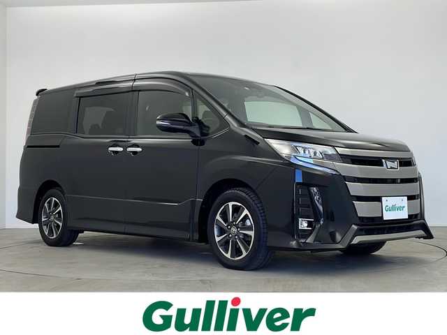 トヨタ ノア Si ダブルバイビーⅡ 鹿児島県 2019(令1)年 2.4万km ブラック 純正１０型ナビ　【TZ-D205W】/バックカメラ　/両側電動スライドドア　/純正ドライブレコーダー/リアサンシェード/プッシュスタート/純正ドアバイザー/純正ＥＴＣ　/クルーズコントロール　/トヨタセーフティセンス　/プリクラッシュセーフティ　/アイドリングストップ　/スマートキー　/禁煙車
