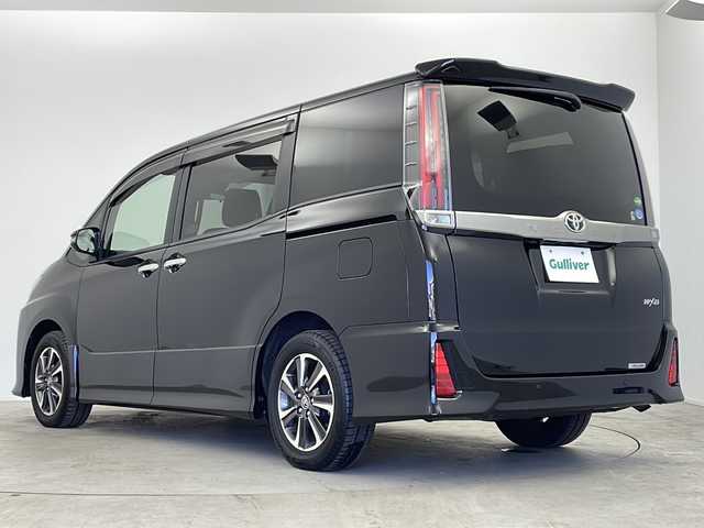 トヨタ ノア Si ダブルバイビーⅡ 鹿児島県 2019(令1)年 2.4万km ブラック 純正１０型ナビ　【TZ-D205W】/バックカメラ　/両側電動スライドドア　/純正ドライブレコーダー/リアサンシェード/プッシュスタート/純正ドアバイザー/純正ＥＴＣ　/クルーズコントロール　/トヨタセーフティセンス　/プリクラッシュセーフティ　/アイドリングストップ　/スマートキー　/禁煙車