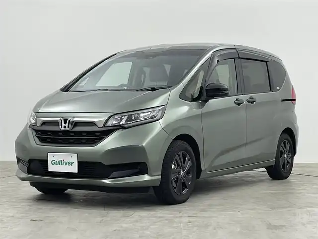 ホンダ フリード ハイブリット G ブラックスタイル 群馬県 2023(令5)年 0.7万km シルバーミストグリーンM 純正９インチナビ　バックカメラ　衝突軽減ブレーキ　レーダークルーズコントロール　レーンキープアシスト　シートヒーター　両側パワースライドドア　コーナーセンサー　ドライブレコーダー　ＥＴＣ　禁煙車