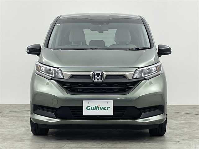 ホンダ フリード ハイブリット G ブラックスタイル 群馬県 2023(令5)年 0.7万km シルバーミストグリーンM 純正９インチナビ　バックカメラ　衝突軽減ブレーキ　レーダークルーズコントロール　レーンキープアシスト　シートヒーター　両側パワースライドドア　コーナーセンサー　ドライブレコーダー　ＥＴＣ　禁煙車