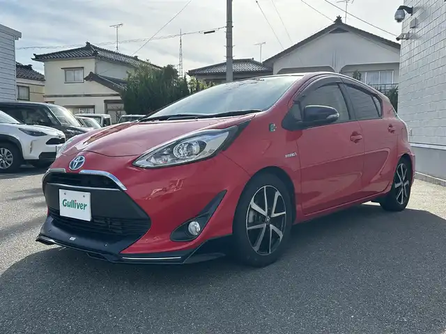 トヨタ アクア リルヴィーS 山形県 2018(平30)年 4.4万km スーパーレッドⅤ 純正ナビ/AM/FM/TV/SD//Bluetooth/ベージュレザーシート/衝突被害軽減装置/禁煙車/バックカメラ/前後コーナーセンサー/社外フロントエアロ/ETC2.0/LEDヘッドライト/クルーズコントロール/スマートキー/シートヒーターD/N/前ドライブレコーダー/純正オーディオ/フォグランプ/プッシュスタート/レーンキープアシスト/オートライト/オートハイビーム/T-connect/横滑り軽減装置/ナノイー/ドアバイザー/冬タイヤ積載/保証書/取扱説明書