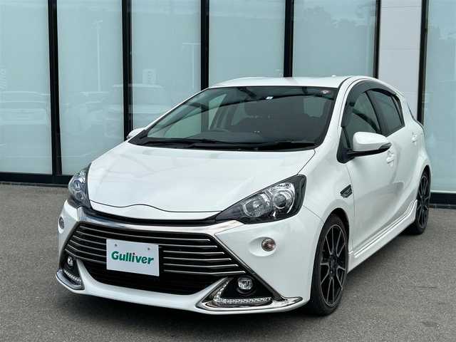 トヨタ アクア G G’s 大阪府 2016(平28)年 4.8万km ライムホワイトパールクリスタルシャイン 社外8インチナビ（サイバーナビ）　/   フルセグTV/CD/DVD/Bluetooth /USB /バックカメラ　　/横滑り防止装置/クルーズコントロール/レーンキープアシスト/ドライブレコーダー（前方）/オートマチックハイビーム/純正フロアマット/プッシュスタート/スマートキー　/純正17インチアルミホイール（G’s）　/純正エアロ（フロント、リア、サイド）　/LEDヘッドランプ　/ETC/LED　