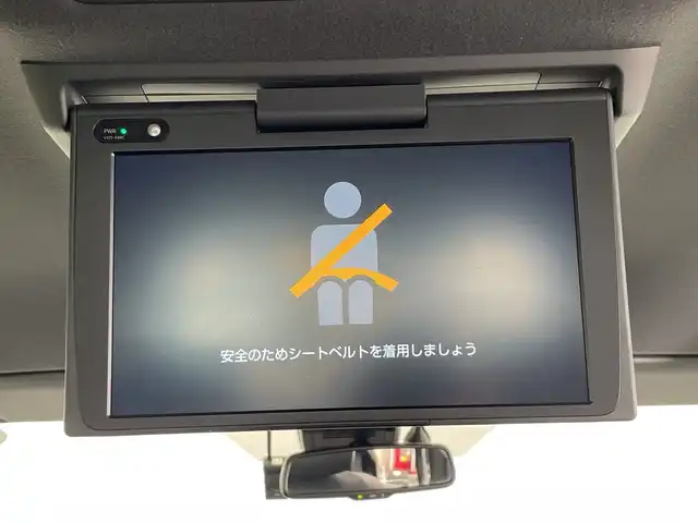 トヨタ エスクァイア ハイブリッド 栃木県 2019(令1)年 3.8万km スパークリングブラックパールクリスタルシャイン 純正10インチナビ/（CD/DVD/Bluetooth/SD/iPod）/バックカメラ/純正ビルトインETC/トヨタセーフティセンス/・プリクラッシュセーフティ/・レーンディパーチャーアラート/・オートマチックハイビーム/・先行発進車お知らせ/・クリアランスソナー/PKSB/前方ドラレコ/両側パワースライドドア/ハーフレザーシート/シートヒーター/禁煙車/ステアリングヒーター/フリップダウンモニター/オートライト/LEDヘッドライト/AC100V電源/スマートキー/プッシュスタート/ステアリングスイッチ/電動格納ミラー/純正アルミホイール/純正フロアマット