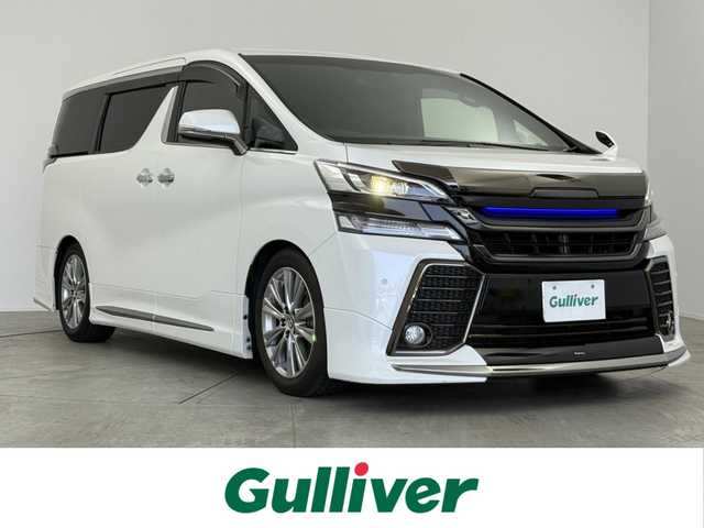トヨタ ヴェルファイア Z Gエディション 愛知県 2016(平28)年 4.8万km ホワイトパールクリスタルシャイン 純正ナビ/後席フリップダウン/バックカメラ/クルーズコントロール/パワーシート/ハーフレザー/ステアリングヒーター/電動リアゲード/Bluetooth/フルセグTV/ETC装備/両側パワースライドドア/オットマン/オートホールド/メモリシート/サンシェード/後席オートエアコン/ソナー/純正18インチAW