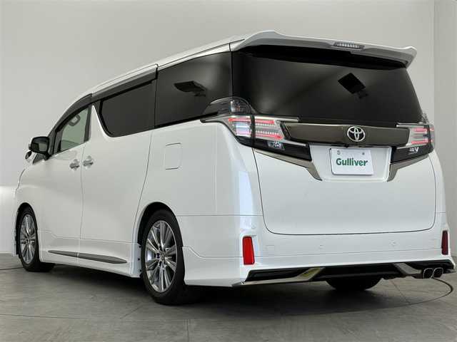トヨタ ヴェルファイア Z Gエディション 愛知県 2016(平28)年 4.8万km ホワイトパールクリスタルシャイン 純正ナビ/後席フリップダウン/バックカメラ/クルーズコントロール/パワーシート/ハーフレザー/ステアリングヒーター/電動リアゲード/Bluetooth/フルセグTV/ETC装備/両側パワースライドドア/オットマン/オートホールド/メモリシート/サンシェード/後席オートエアコン/ソナー/純正18インチAW