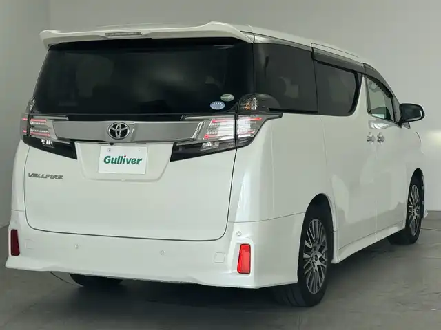 トヨタ ヴェルファイア Z Gエディション 広島県 2016(平28)年 4.8万km ホワイトパールクリスタルシャイン 純正ナビ/後席フリップダウン/バックカメラ/クルーズコントロール/パワーシート/ハーフレザー/ステアリングヒーター/電動リアゲード/Bluetooth/フルセグTV/ETC装備/両側パワースライドドア/オットマン/オートホールド/メモリシート/サンシェード/後席オートエアコン/ソナー/純正18インチAW