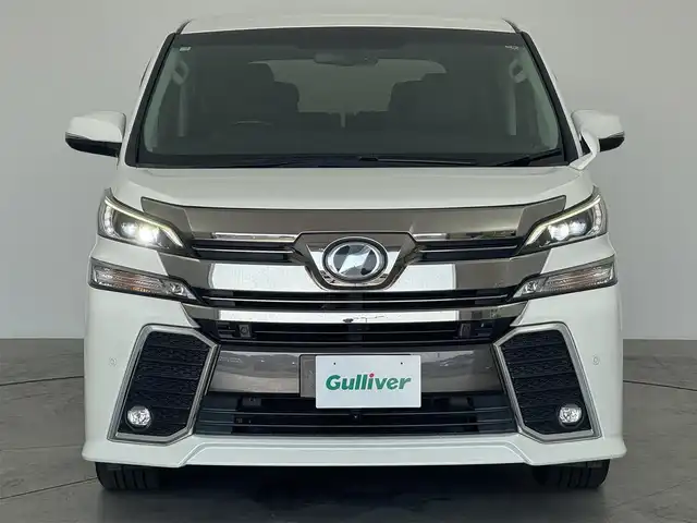 トヨタ ヴェルファイア Z Gエディション 広島県 2016(平28)年 4.8万km ホワイトパールクリスタルシャイン 純正ナビ/後席フリップダウン/バックカメラ/クルーズコントロール/パワーシート/ハーフレザー/ステアリングヒーター/電動リアゲード/Bluetooth/フルセグTV/ETC装備/両側パワースライドドア/オットマン/オートホールド/メモリシート/サンシェード/後席オートエアコン/ソナー/純正18インチAW
