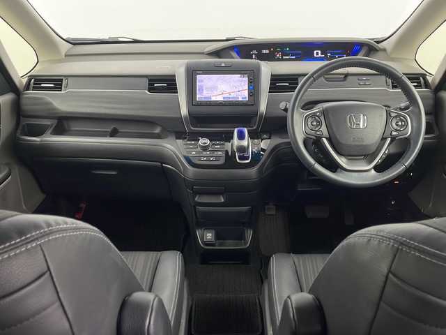 ホンダ フリード ハイブリット EX 埼玉県 2017(平29)年 5.5万km モダンスティールM 純正７インチナビ（VXM-174VFXi/）/バックカメラ/両側パワースライドドア/ビルトインＥＴＣ/前席シートヒーター/アダプティブクルーズコントロール/レーンキープアシスト/衝突軽減ブレーキ/横滑り防止装置/車線逸脱警報/ロールサンシェード/オートライト/LEDヘッドライト/ハーフレザーシート/純正フロアマット/純正アルミホイール