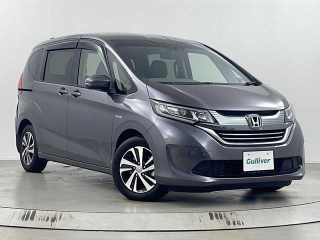 ホンダ フリード ハイブリット EX 埼玉県 2017(平29)年 5.5万km モダンスティールM 純正７インチナビ（VXM-174VFXi/）/バックカメラ/両側パワースライドドア/ビルトインＥＴＣ/前席シートヒーター/アダプティブクルーズコントロール/レーンキープアシスト/衝突軽減ブレーキ/横滑り防止装置/車線逸脱警報/ロールサンシェード/オートライト/LEDヘッドライト/ハーフレザーシート/純正フロアマット/純正アルミホイール