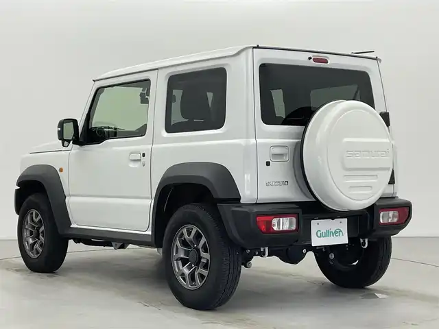 スズキ ジムニー シエラ JC 富山県 2023(令5)年 2.1万km ピュアホワイトP 4WD/社外メモリナビ（AM/FM/CD/USB/BT）/ワンセグTV/バックカメラ/デュアルセンサーブレーキサポート/レーンキープアシスト/クルーズコントロール/横滑り防止装置/ETC/ドライブレコーダー前後/純正15インチAW/前席シートヒーター/ダウンヒルアシストコントロール/LEDヘッドライト/フォグランプ/オートライト/ヘッドライトウォッシャー/社外タイヤカバー/プッシュスタート/スマートキー（スペアキー有）/純正フロアマット/取扱説明書/保証書