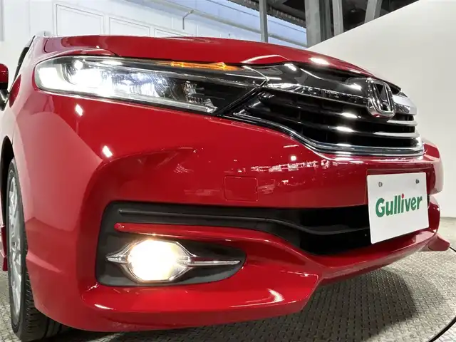 ホンダ シャトル ハイブリッド Z スタイルエディション 大阪府 2016(平28)年 2.1万km ミラノレッド 純正ナビ(フルセグ/DVD再生/Bluetooth) バックカメラ ETC 衝突軽減 クルコン ハーフレザー シートヒーター オートライト スマートキー プッシュスタート ワンオーナー 禁煙車