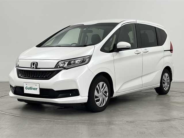 ホンダ フリード G ホンダセンシング 群馬県 2022(令4)年 1.4万km プラチナホワイトパール 純正９型ナビ　衝突被害軽減ブレーキ　アダプティブクルーズコントロール　バックカメラ　ビルトインＥＴＣ　ドライブレコーダー　シートヒーター　レーンキープアシスト　ステアリングリモコン　ＬＥＤ　禁煙車