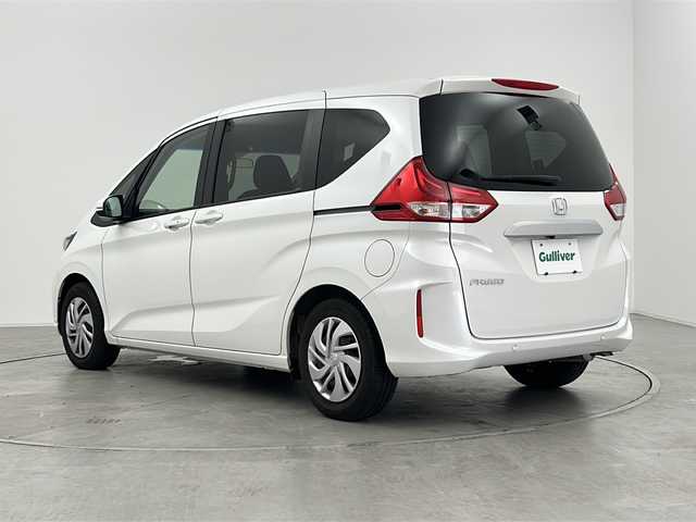 ホンダ フリード G ホンダセンシング 群馬県 2022(令4)年 1.4万km プラチナホワイトパール 純正９型ナビ　衝突被害軽減ブレーキ　アダプティブクルーズコントロール　バックカメラ　ビルトインＥＴＣ　ドライブレコーダー　シートヒーター　レーンキープアシスト　ステアリングリモコン　ＬＥＤ　禁煙車