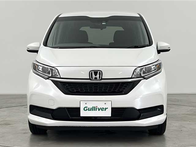 ホンダ フリード G ホンダセンシング 群馬県 2022(令4)年 1.4万km プラチナホワイトパール 純正９型ナビ　衝突被害軽減ブレーキ　アダプティブクルーズコントロール　バックカメラ　ビルトインＥＴＣ　ドライブレコーダー　シートヒーター　レーンキープアシスト　ステアリングリモコン　ＬＥＤ　禁煙車
