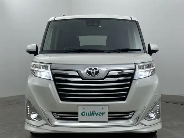 トヨタ ルーミー カスタムG－T 広島県 2020(令2)年 4.5万km パールホワイトⅢ 純正９インチナビ	/【ナビ/フルセグ/Bluetooth/DVD】	/パノラミックビューモニター	/クルーズコントロール	/オートハイビーム	/LEDヘッドライト（AUTO機能付き）	/ビルトインETC2.0	/前席シートヒーター	/衝突軽減ブレーキシステム	/車線逸脱防止システム	/横滑り防止装置	/踏み間違い防止装置/純正ドライブレコーダー（前）	/純正15インチアルミ	/コーナーセンサー（前後）	/社外フロントスポイラー/純正フロアマット	/ステアリングスイッチ	/チルトステアリング/シートリフター/シートバックテーブル/ウィンカーミラー	/プッシュスタート