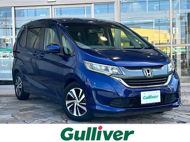 ホンダ フリード G 静岡県 2016(平28)年 6.1万km コバルトブルーパール 純正ナビ/・CD/DVD/・FM/AM/・TV/・Music Rack/・SD/・Bluetooth/主要装備/・後席フリップダウンモニター/・バックカメラ/・片側パワースライドドア/・ＥＴＣ/・１５インチアルミ/・アクティブコーナリングライト/・ＬＥＤヘッドライト/・横滑り防止装置/・アイドリングストップ/・オートライト/・コンビシート/・本革巻ステアリングホイール