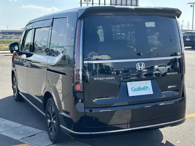 ホンダ ステップワゴン スパーダ eHEV 佐賀県 2024(令6)年 2.2万km 黒 純正11.4インチナビ/フルセグTV/Bluetooth/USB/１２Vソケット/バックカメラ/前後純正ドラレコ/両側パワースライドドア/アダクティブクルーズコントロール/ハーフレザーシート/シートヒーター/オートマチックハイビーム/ビルトインETC/純正16インチアルミ/純正フロアマット/新車保証書/取扱説明書/スペアキー1本/ホンダセンシング/横滑り防止機能/レーンキープアシスト/衝突被害軽減システム/ブラインドスポットモニター