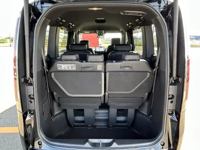 ホンダ ステップワゴン スパーダ eHEV 佐賀県 2024(令6)年 2.2万km 黒 純正11.4インチナビ/フルセグTV/Bluetooth/USB/１２Vソケット/バックカメラ/前後純正ドラレコ/両側パワースライドドア/アダクティブクルーズコントロール/ハーフレザーシート/シートヒーター/オートマチックハイビーム/ビルトインETC/純正16インチアルミ/純正フロアマット/新車保証書/取扱説明書/スペアキー1本/ホンダセンシング/横滑り防止機能/レーンキープアシスト/衝突被害軽減システム/ブラインドスポットモニター