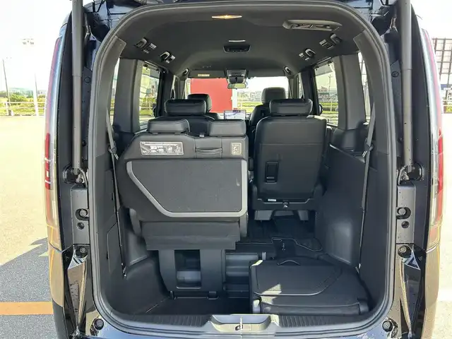 ホンダ ステップワゴン スパーダ eHEV 佐賀県 2024(令6)年 2.2万km 黒 純正11.4インチナビ/フルセグTV/Bluetooth/USB/１２Vソケット/バックカメラ/前後純正ドラレコ/両側パワースライドドア/アダクティブクルーズコントロール/ハーフレザーシート/シートヒーター/オートマチックハイビーム/ビルトインETC/純正16インチアルミ/純正フロアマット/新車保証書/取扱説明書/スペアキー1本/ホンダセンシング/横滑り防止機能/レーンキープアシスト/衝突被害軽減システム/ブラインドスポットモニター