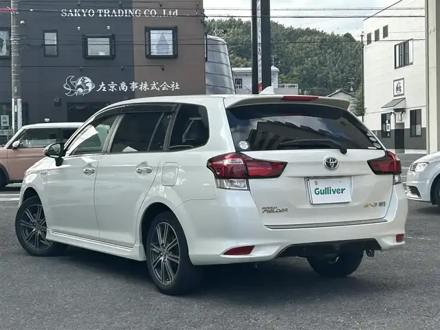 トヨタ カローラ フィールダー ハイブリッドG ダブルバイビー 静岡県 2015(平27)年 6.7万km ホワイトパールクリスタルシャイン 純正ナビ/フルセグTV/DVD/CD/SD/MSV/BT/バックカメラ/ハーフレザーシート/プリクラッシュセーフティ/レーンキープアシスト/オートハイビーム/ステアリングスイッチ/ビルトインETC/LEDヘッドライト/純正16インチAW/保証書/取扱説明書/ナビ取扱説明書/H30/R5/R6/R7点検記録簿有