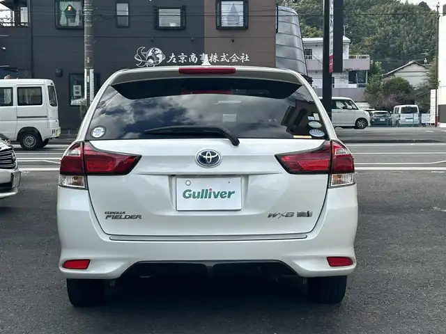 トヨタ カローラ フィールダー ハイブリッドG ダブルバイビー 静岡県 2015(平27)年 6.7万km ホワイトパールクリスタルシャイン 純正ナビ/フルセグTV/DVD/CD/SD/MSV/BT/バックカメラ/ハーフレザーシート/プリクラッシュセーフティ/レーンキープアシスト/オートハイビーム/ステアリングスイッチ/ビルトインETC/LEDヘッドライト/純正16インチAW/保証書/取扱説明書/ナビ取扱説明書/H30/R5/R6/R7点検記録簿有