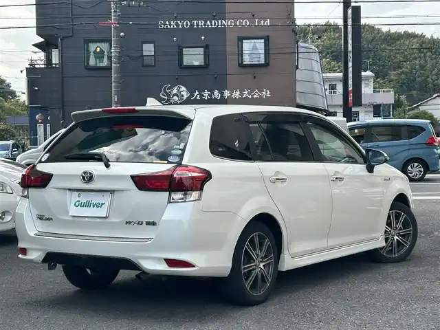 トヨタ カローラ フィールダー ハイブリッドG ダブルバイビー 静岡県 2015(平27)年 6.7万km ホワイトパールクリスタルシャイン 純正ナビ/フルセグTV/DVD/CD/SD/MSV/BT/バックカメラ/ハーフレザーシート/プリクラッシュセーフティ/レーンキープアシスト/オートハイビーム/ステアリングスイッチ/ビルトインETC/LEDヘッドライト/純正16インチAW/保証書/取扱説明書/ナビ取扱説明書/H30/R5/R6/R7点検記録簿有