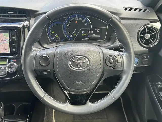 トヨタ カローラ フィールダー ハイブリッドG ダブルバイビー 静岡県 2015(平27)年 6.7万km ホワイトパールクリスタルシャイン 純正ナビ/フルセグTV/DVD/CD/SD/MSV/BT/バックカメラ/ハーフレザーシート/プリクラッシュセーフティ/レーンキープアシスト/オートハイビーム/ステアリングスイッチ/ビルトインETC/LEDヘッドライト/純正16インチAW/保証書/取扱説明書/ナビ取扱説明書/H30/R5/R6/R7点検記録簿有