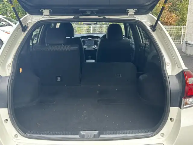 トヨタ カローラ フィールダー ハイブリッドG ダブルバイビー 静岡県 2015(平27)年 6.7万km ホワイトパールクリスタルシャイン 純正ナビ/フルセグTV/DVD/CD/SD/MSV/BT/バックカメラ/ハーフレザーシート/プリクラッシュセーフティ/レーンキープアシスト/オートハイビーム/ステアリングスイッチ/ビルトインETC/LEDヘッドライト/純正16インチAW/保証書/取扱説明書/ナビ取扱説明書/H30/R5/R6/R7点検記録簿有