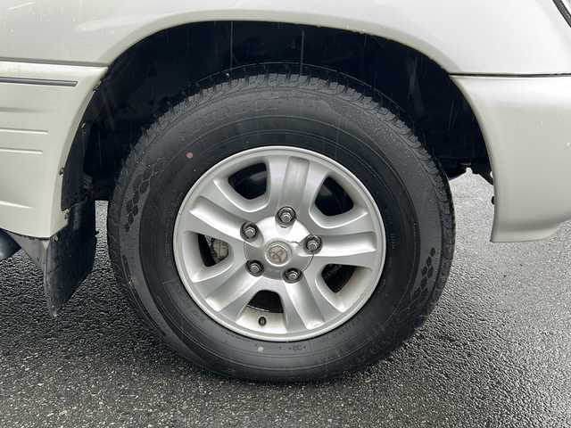 トヨタ ランドクルーザー VX－LTD 京都府 2004(平16)年 17.7万km ホワイトパールクリスタルシャイン 純正HDDナビ/ワンセグテレビ/バックカメラ/ETC/クルーズコントロール/センターデフロック/ハンドルカバー