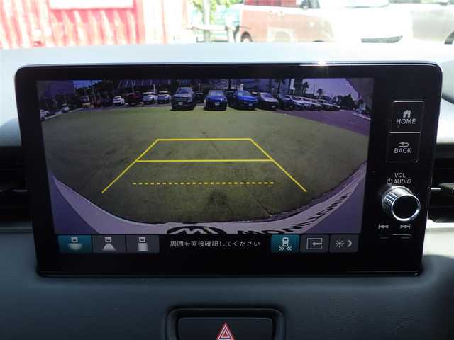 ホンダ ヴェゼル ハイブリッド e:HEV Z 千葉県 2025(令7)年 0.1千km プラチナホワイトパール e:HEV Z　3VC4AG3　Honda CONNECTディスプレー+ETC2.0車載器+ワイヤレス充電器(220/000)/ホンダセンシング/・衝突軽減ブレーキ（CMBS）/・車線維持支援システム（LKAS）/・アダプティブクルーズコントロール（ACC）/・後方誤発進抑制機能/・誤発進抑制機能/パワーバックドア/9インチ純正コネクトナビ/地デジTV/【Bluetooth接続】/【Apple CarPlay　Android Auto対応】/バックカメラ/リバース連動ドアミラー（左）/ワイヤレス充電/ハーフレザーシート/前席シートヒーター/純正フロアマット/革巻きステアリング/ステアリングスイッチ/パドルシフト/ETC/LEDヘッドライト/フォグライト/ウインカーミラー/コーナーセンサー/純正18インチアルミホイル/サイド/カーテンエアバッグ/スマートキー