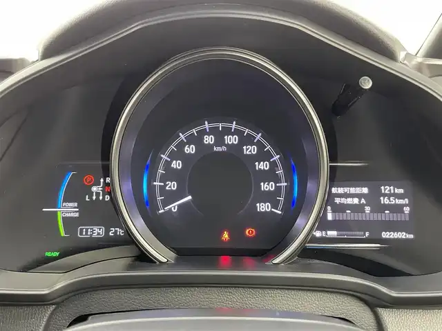 ホンダ フィット ハイブリット L ホンダセンシング 富山県 2019(平31)年 2.3万km ルージュアメジストM 純正ナビ（AM/FM/CD/BT/USB）/バックカメラ/ドライブレコーダー/ETC/ハーフレザーシート/衝突被害軽減システム/レーダークルーズコントロール/レーンキープアシスト/横滑り防止装置/アイドリングストップ/オートLEDライト/フォグライト/純正フロアマット/革巻きステアリング/ステアリングスイッチ/スマートキー/スペアキー