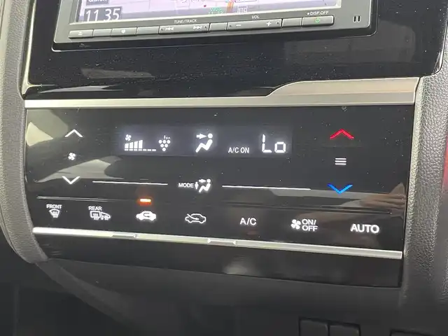 ホンダ フィット ハイブリット L ホンダセンシング 富山県 2019(平31)年 2.3万km ルージュアメジストM 純正ナビ（AM/FM/CD/BT/USB）/バックカメラ/ドライブレコーダー/ETC/ハーフレザーシート/衝突被害軽減システム/レーダークルーズコントロール/レーンキープアシスト/横滑り防止装置/アイドリングストップ/オートLEDライト/フォグライト/純正フロアマット/革巻きステアリング/ステアリングスイッチ/スマートキー/スペアキー