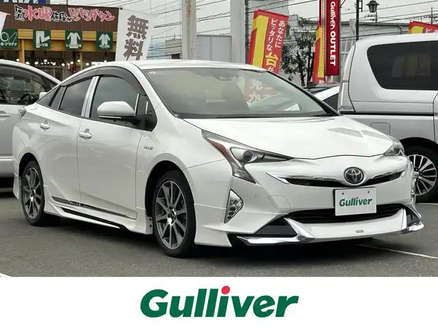 トヨタ プリウス A ツーリングセレクション 群馬県 2017(平29)年 3.4万km ホワイトパールクリスタルシャイン モデリスタエアロ/純正9型ナビ/CD・DVD・SD/BT・フルセグTV/バックカメラ/ビルトインETC/前後ドライブレコーダー/TRDアルミホイール/前席シートヒーター/クルーズコントロール/ヘッドアップディスプレイ/横滑り防止装置/レーンキープアシスト/衝突軽減ブレーキ/アイドリングストップ/取説・保証書/スマートキー×2