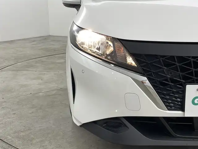 日産 ノート X 福島県 2021(令3)年 3.5万km ピュアホワイトパール 360°セーフティアシスト/・衝突被害軽減ブレーキ/・踏み間違い防止装置/・標識検知機能/・前方衝突予測警報/・車線逸脱警報装置/・電子パーキング/・オートブレーキホールド/・オートマチックハイビーム/純正9インチナビ/・フルセグTV/BT/SD/USB/iPod/AM/FM/・ETC/・バックカメラ/・純正ドライブレコーダー（前方）/革張ステアリング/・ステアリングリモコン/・ステアリングヒーター/プッシュスタート/・スマートキー/・スペアキー1本/電動格納ミラー/・ウィンカーミラー/HIDヘッドライト/・オートライト/寒冷地仕様/ドアバイザー/純正フロアマット/社外16インチAW