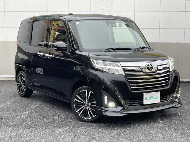 トヨタ ルーミー カスタムG 東京都 2019(令1)年 7.3万km ブラックマイカメタリック 純正SDナビ/　ワンセグTV/Bluetooth/CD/AM・FM/SD/AUX/バックカメラ/衝突回避支援ブレーキ/衝突警報機能/車線逸脱警報/誤発進抑制制御/先行車発信お知らせ/オートハイビーム/コーナーセンサー/クルーズコントロール/両側パワースライドドア/LEDヘッドライト/LEDフォグランプ/オートライト/前後ドライブレコーダー/シートヒーター/純正フロアマット/ビルトインETC/社外16インチアルミホイール/プッシュスタート/スマートキー/電動オート格納ミラー/ウインカーミラー/革巻きステアリングホイール/社外多機能コンソール/保証書/取扱説明書