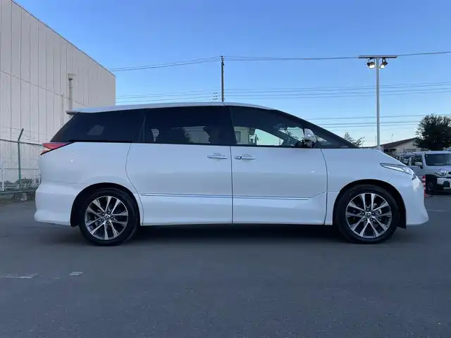 トヨタ エスティマ アエラス プレミアム 東京都 2018(平30)年 6.9万km ホワイトパールクリスタルシャイン ワンオーナー/純正９型ナビ/フルセグＴＶ／ＣＤ／ＤＶＤ再生／ＢＴ/純正１２型フリップダウンモニター/両側電動スライドドア/ビルトインＥＴＣ/ドライブレコーダー/パワーシート/ＬＥＤヘッドライト/オットマン/プリクラッシュセーフティ/レーンディパーチャーアラート/クリアランスソナー/クルーズコントロール