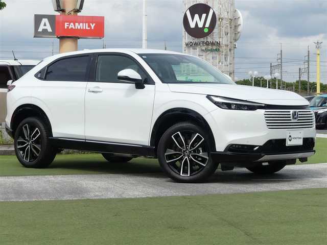 ホンダ ヴェゼル ハイブリッド e:HEV Z 千葉県 2025(令7)年 0.1万km未満 プラチナホワイトパール e:HEV Z　3VC4AG3　Honda CONNECTディスプレー+ETC2.0車載器+ワイヤレス充電器(220/000)/ホンダセンシング/・衝突軽減ブレーキ（CMBS）/・車線維持支援システム（LKAS）/・アダプティブクルーズコントロール（ACC）/・後方誤発進抑制機能/・誤発進抑制機能/パワーバックドア/ハーフレザーシート/前席シートヒーター/純正コネクトナビ/地デジTV/【Bluetooth接続】/【Apple CarPlay　Android Auto対応】/バックカメラ/ワイヤレス充電/革巻きステアリング/ステアリングスイッチ/パドルシフト/ETC（2.0）/LEDヘッドライト/フォグライト/ウインカーミラー/コーナーセンサー/純正18インチアルミホイル/サイド/カーテンエアバッグ/Honda スマートキー