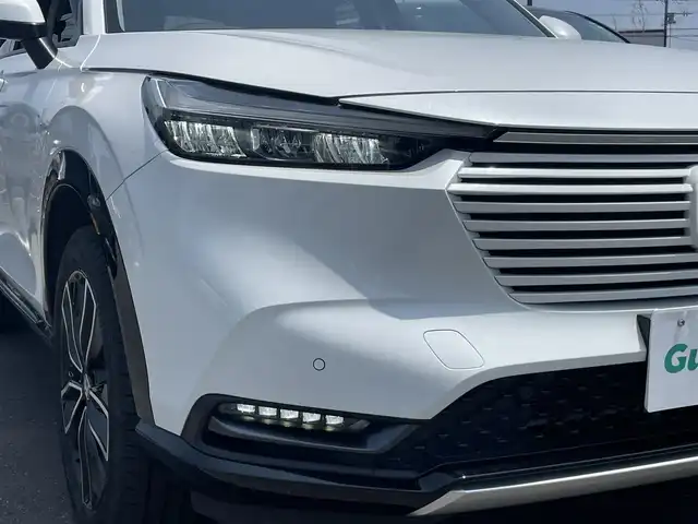 ホンダ ヴェゼル ハイブリッド e:HEV Z 茨城県 2023(令5)年 2.3万km プラチナホワイトパール 純正ナビ/【ＣＤ・ＤＶＤ・ＳＤ・ＵＳＢ・AM・FM・TV・BT・AUX・iPod】/シートヒーター/ステアリングヒーター/ワイヤレス充電/BSM/電動リアゲート/パドルシフト/ダウンヒルアシストコントロール/ブレーキホールド/レーダークルコン/ETC/Bカメラ/前後コーナーセンサー/オートライト/Fフォグ