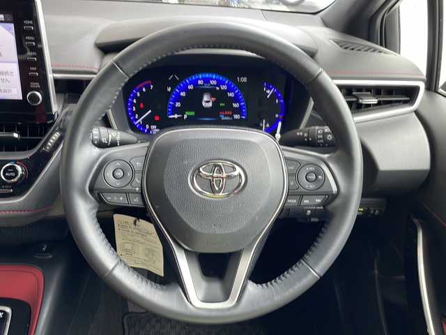 トヨタ カローラ スポーツ ハイブリッドG Z 愛知県 2020(令2)年 2.6万km ベージュM/ホワイトパールマイカ 衝突軽減システム/純正ディスプレイオーディオ（ナビあり）/レーダークルーズコントロール/シートヒーター/ワンセグ/Bluetooth/バックカメラ/コーナーセンサー/純正アルミホイール/ブラインドスポットモニター/ＥＴＣ２．０/LEDヘッドライト/オートマチックハイビーム/ドライブレコーダー/ステアリングスイッチ/スマートキー/プッシュスタート