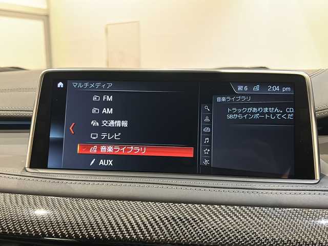 ＢＭＷ Ｘ６ Ｍ 新潟県 2018(平30)年 3.7万km カーボンブラックM オプション/カーボンファイバーインテリアトリム/純正21インチアルミホイール/主要装備/インテリジェントセーフティ/-衝突被害軽減ブレーキ/-レーンキープアシスト/-ブラインドスポットアシスト/純正HDDナビ/(CD/DVD/Bluetooth/USB/AUX/フルセグTV)/トップビューカメラ/ETC/ドライブレコーダー/ブラックレザーシート/シートヒーター/メモリ付きパワーシート/パワーバックドア/LEDヘッドライト/コーナーセンサー/パドルシフト/クルーズコントロール