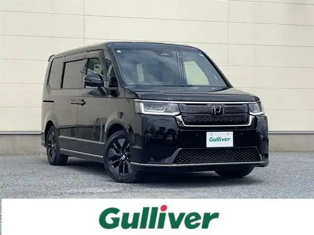 ホンダ ステップワゴン スパーダ 茨城県 2024(令6)年 1.4万km クリスタルブラックパール 9型純正ナビ/【AM/FM/CD/DVD/Bluetooth/フルセグ】/ホンダセンシング/-車線逸脱警報/-レーンキープアシスト/-BSM/-踏み間違い防止/-オートクルーズコントロール/バックカメラ/両側パワースライドドア/パワーバックドア/ハーフレザーシート/シートヒーター/LEDライト/ETC/ドライブレコーダー前後