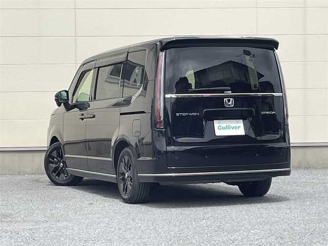 ホンダ ステップワゴン スパーダ 茨城県 2024(令6)年 1.4万km クリスタルブラックパール 9型純正ナビ/【AM/FM/CD/DVD/Bluetooth/フルセグ】/ホンダセンシング/-車線逸脱警報/-レーンキープアシスト/-BSM/-踏み間違い防止/-オートクルーズコントロール/バックカメラ/両側パワースライドドア/パワーバックドア/ハーフレザーシート/シートヒーター/LEDライト/ETC/ドライブレコーダー前後