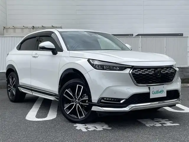 ホンダ ヴェゼル ハイブリッド e:HEV Z 群馬県 2022(令4)年 10.3万km プラチナホワイトパール ワンオーナー/純正アンダーエアロ/ホンダコネクトナビ/Bluetooth/フルセグTV/ホンダセンシング/ブラインドスポットインフォメーション/全方位カメラ/ETC2.0/ワイヤレス充電器/前席シートヒーター/ハンズフリーアクセスパワーテールゲート/純正18インチアルミ/LEDヘッドライト/ステアリングスィッチ/スマートキー2本/W/サイド/カーテンエアバック/保証書/取扱説明書