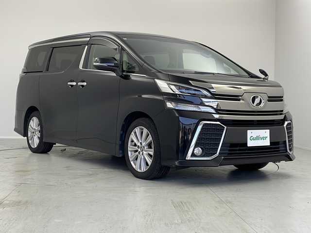 トヨタ ヴェルファイア Z 茨城県 2016(平28)年 6.1万km ブラック ９インチナビ　フルセグＴＶ　両側電動スライドドア　後席モニター　オットマン　ＥＴＣ　１００Ｖ充電　パーキングアシスト　横滑り防止装置　衝突被害軽減ブレーキ　純正１８インチアルミホイール　ＬＥＤライト